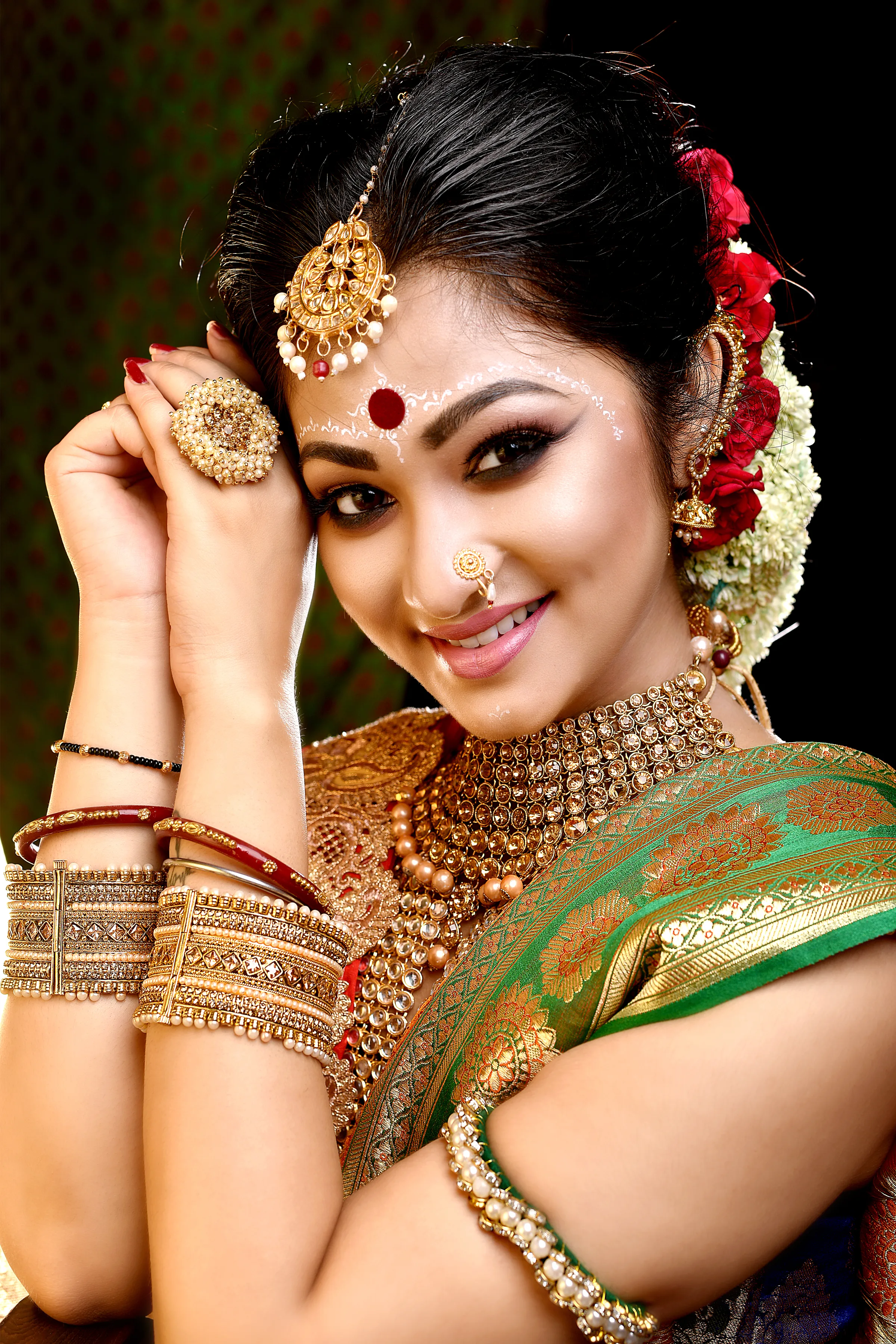 She is poetry draped in a Bengali saree.
