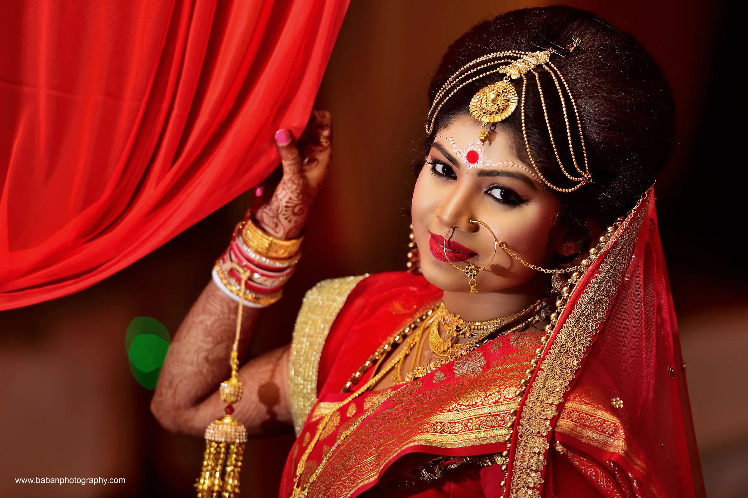 A masterpiece woven in red, gold, and timeless tradition